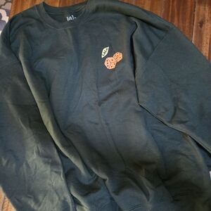 Dressed in lala green sweatshirt